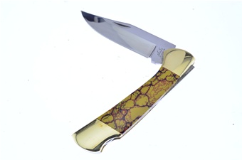 M.Prater Dinosaur Bone Lockback